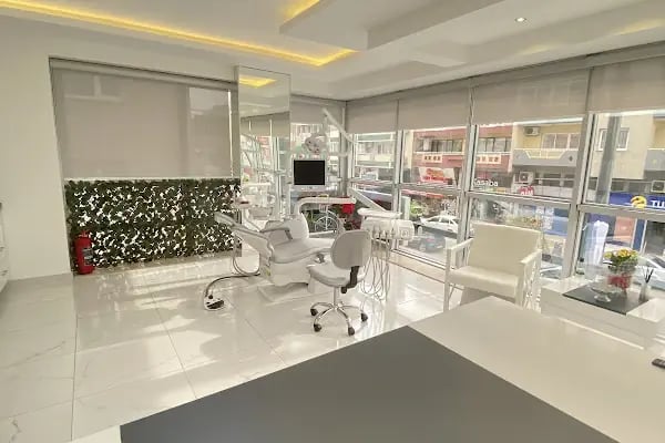 Alihan Akçam Ağız ve Diş Sağlığı Kliniği | Zirkonyum Kaplama, İmplant, Gülüş Tasarımı | Narlıdere Diş Hekimi - Resim 12